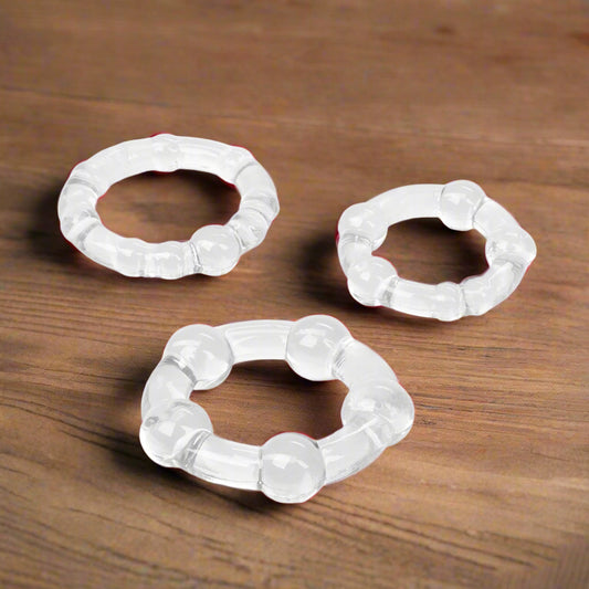 Set of three clear, stretchy Island Rings cock rings by Cal Exotics, featuring distinct textures and sizes for customizable pleasure and enhanced erections
